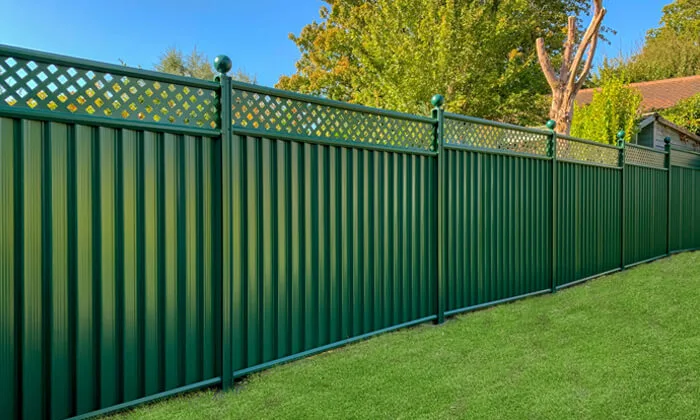 ColourFence steel fencing around a landscaped garden