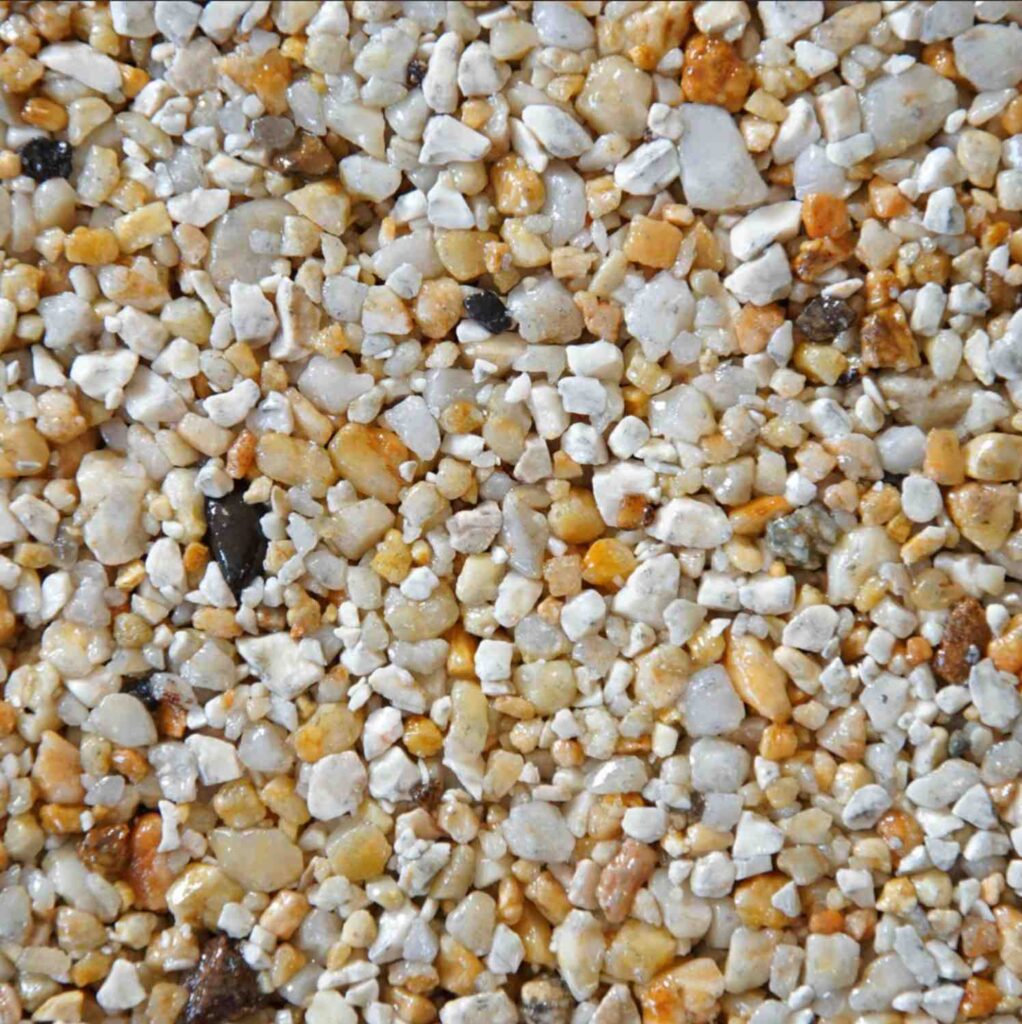 Caramel Latte resin bound aggregate colour for driveways, patios and pathways. Premium resin bound surfacing by Kola Construction, serving Dorset, Bournemouth, Poole and London.