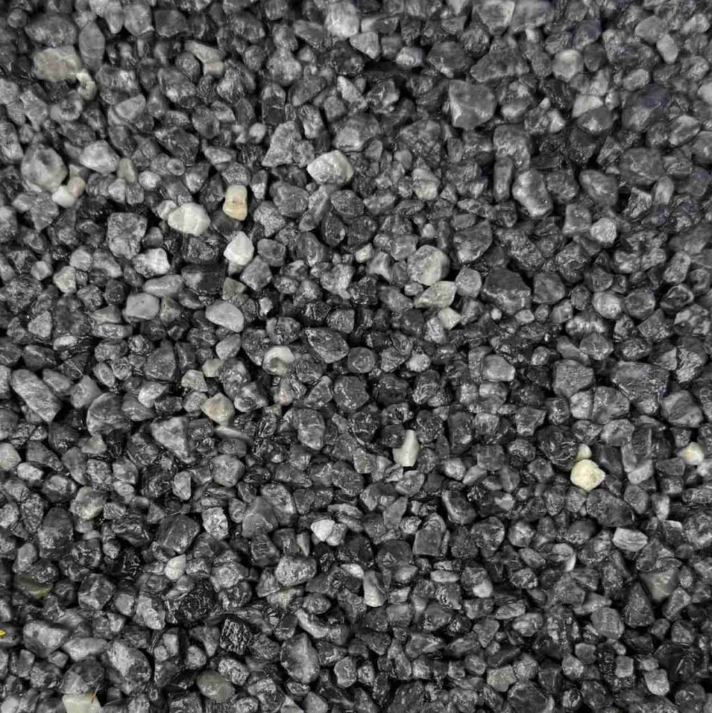 Dark Grey resin bound aggregate colour for driveways, patios and pathways. Premium resin bound surfacing by Kola Construction, serving Dorset, Bournemouth, Poole and London.