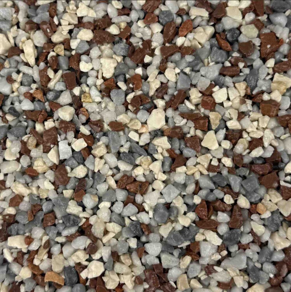Harbour Beach resin bound aggregate colour for driveways, patios and pathways. Premium resin bound surfacing by Kola Construction, serving Dorset, Bournemouth, Poole and London.