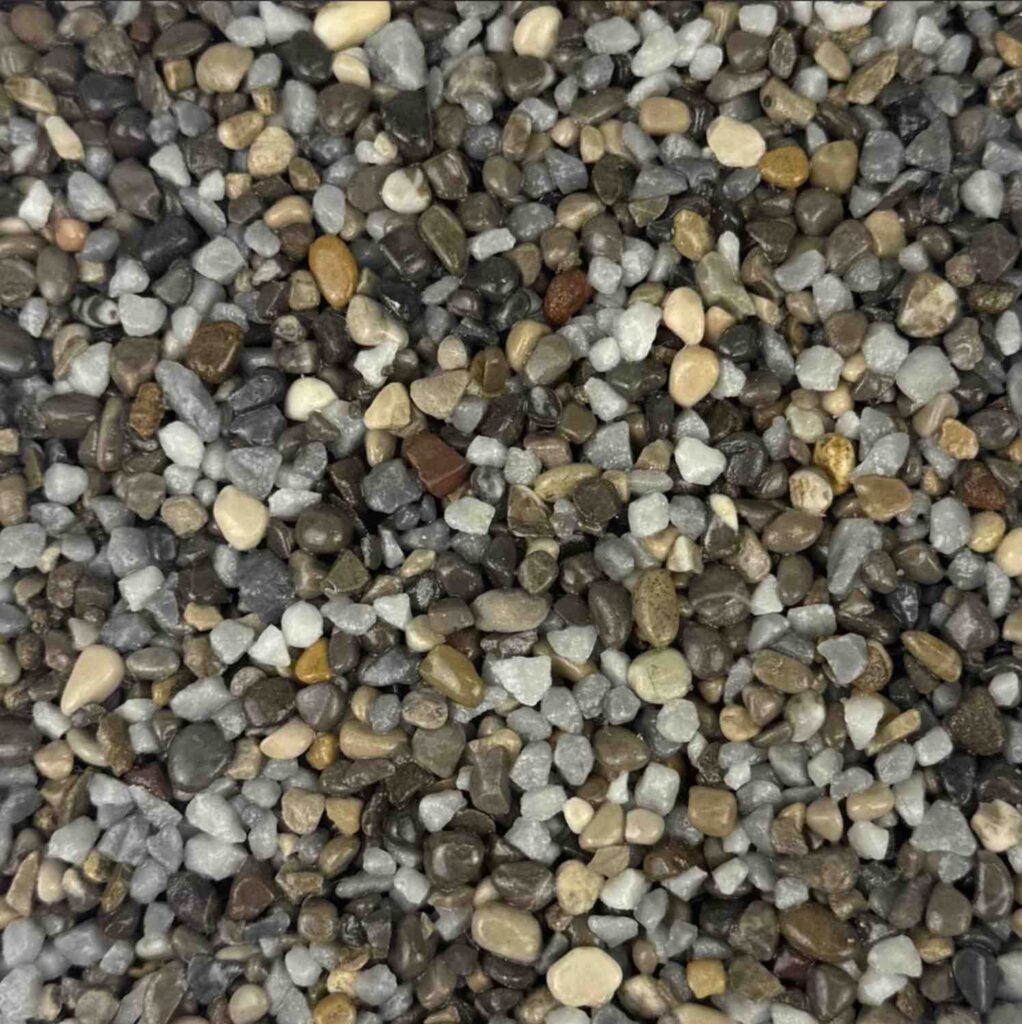 London Clay resin bound aggregate colour for driveways, patios and pathways. Premium resin bound surfacing by Kola Construction, serving Dorset, Bournemouth, Poole and London.