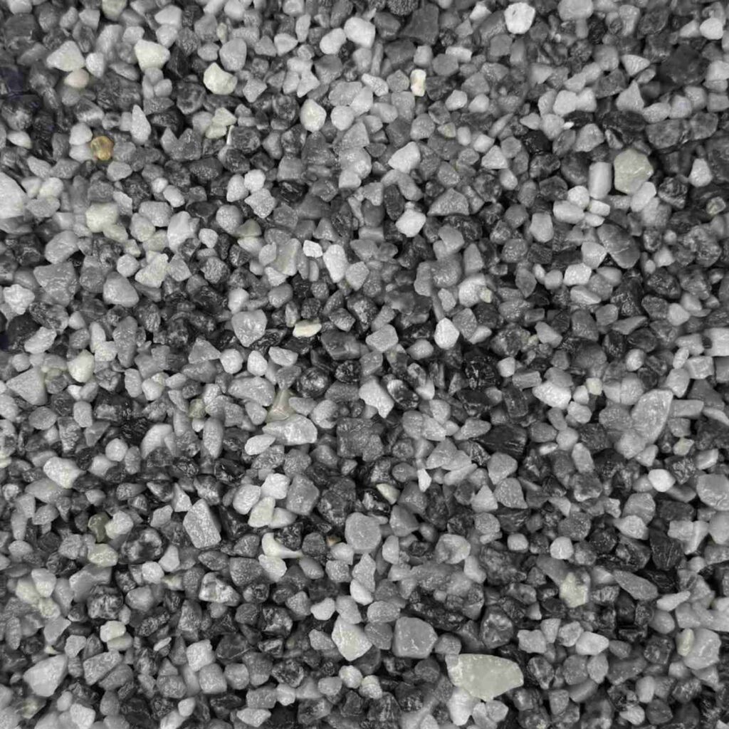 Platinum resin bound aggregate colour for driveways, patios and pathways. Premium resin bound surfacing by Kola Construction, serving Dorset, Bournemouth, Poole and London.
