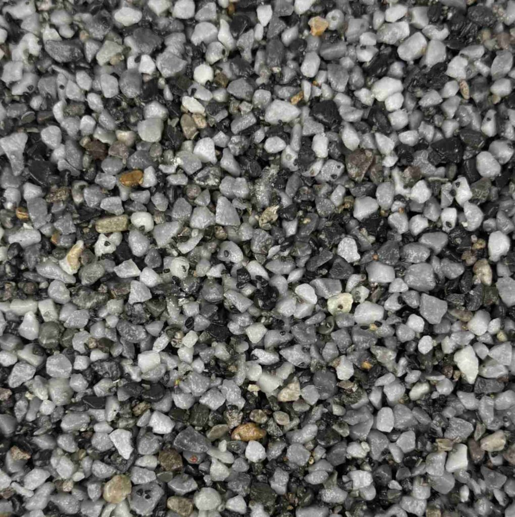 Shadow Blue resin bound aggregate colour for driveways, patios and pathways. Premium resin bound surfacing by Kola Construction, serving Dorset, Bournemouth, Poole and London.
