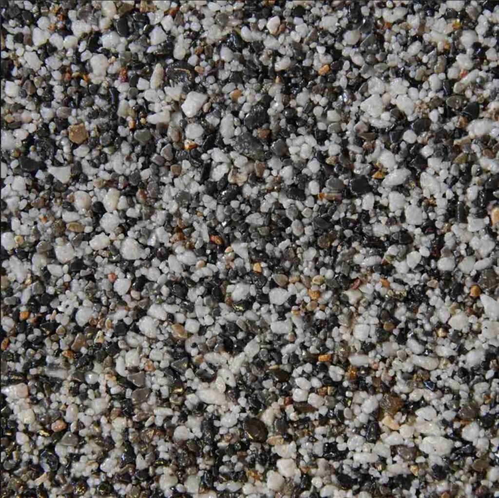 Tundra resin bound aggregate colour for driveways, patios and pathways. Premium resin bound surfacing by Kola Construction, serving Dorset, Bournemouth, Poole and London.